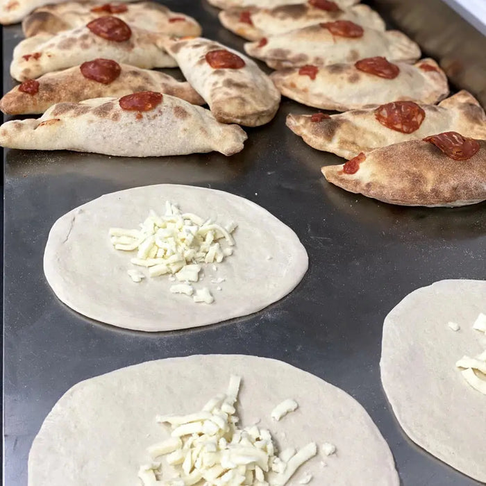 Rustic Calzone Chorizo, Fried Onion, Tomato Mozzarella - 250 grams each Don Arancini